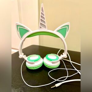 Little girls light up unicorn headphones. Wired. Excellent condition.